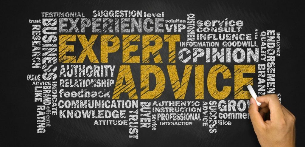Blackboard with expert advice in gold and other related brand role and marketing words