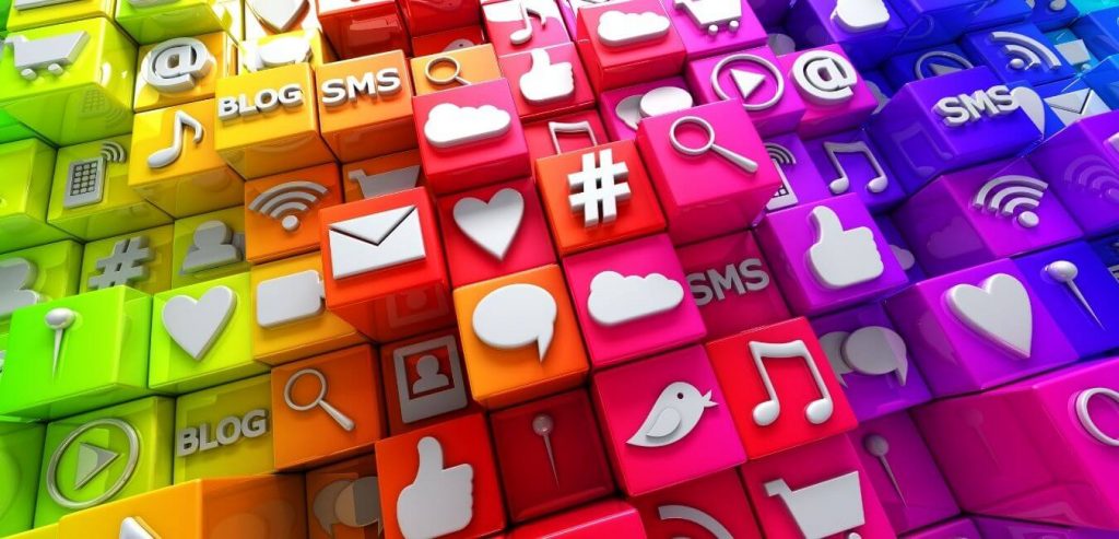social media icons on rainbow colored 3D blocks